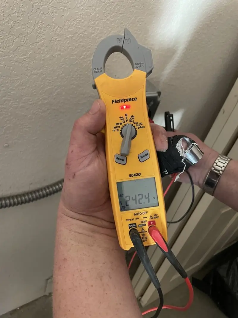 Voltage testing with clamp meter during Circuit Breaker Repair in Hephzibah